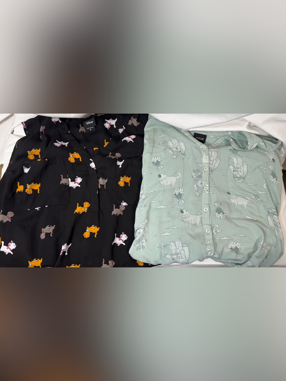 Set of 2 Torrid Disney/ Pixar sleeveless blouses Disney Cats 4X and UP 3X
